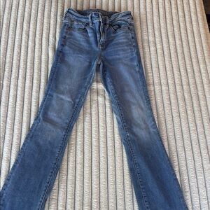 Classic Blue Flare Wide Leg Jeans with Subtle Fading